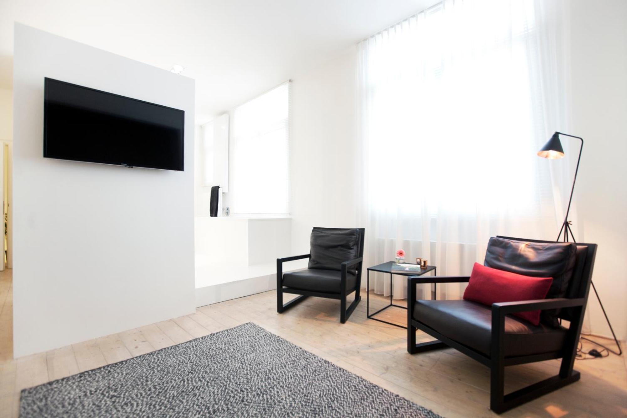 Maison Nationale City Flats & Suites Antwerp Room photo A room at the hotel