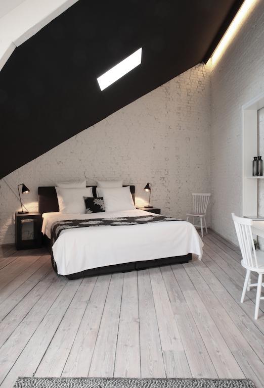 Maison Nationale City Flats & Suites Antwerp Exterior photo A room at the hotel