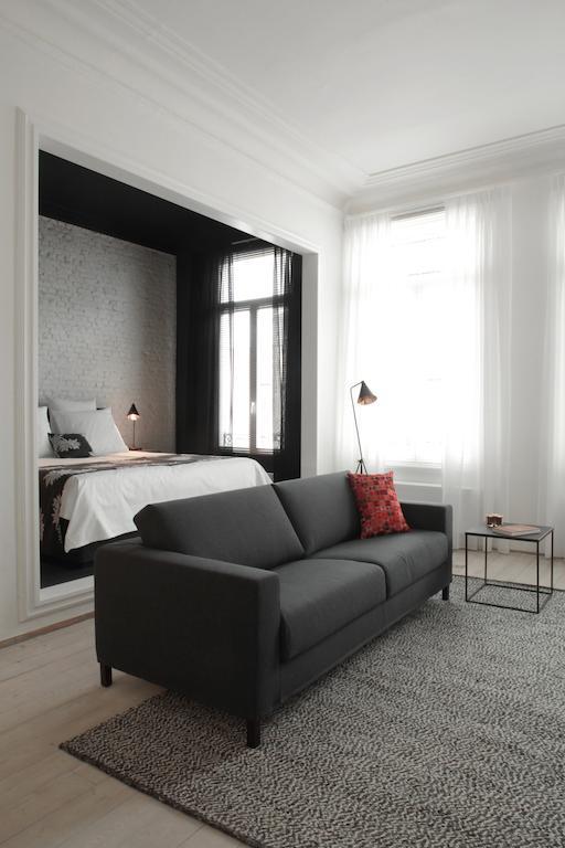 Maison Nationale City Flats & Suites Antwerp Room photo A room at the hotel