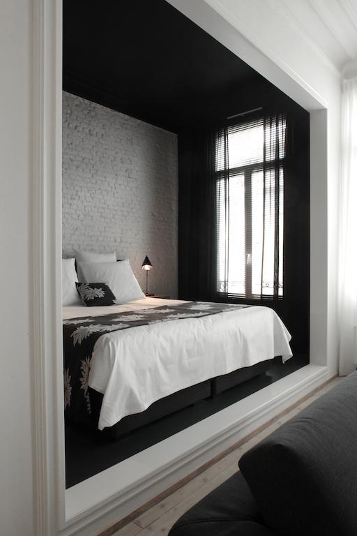 Maison Nationale City Flats & Suites Antwerp Exterior photo A room at the hotel
